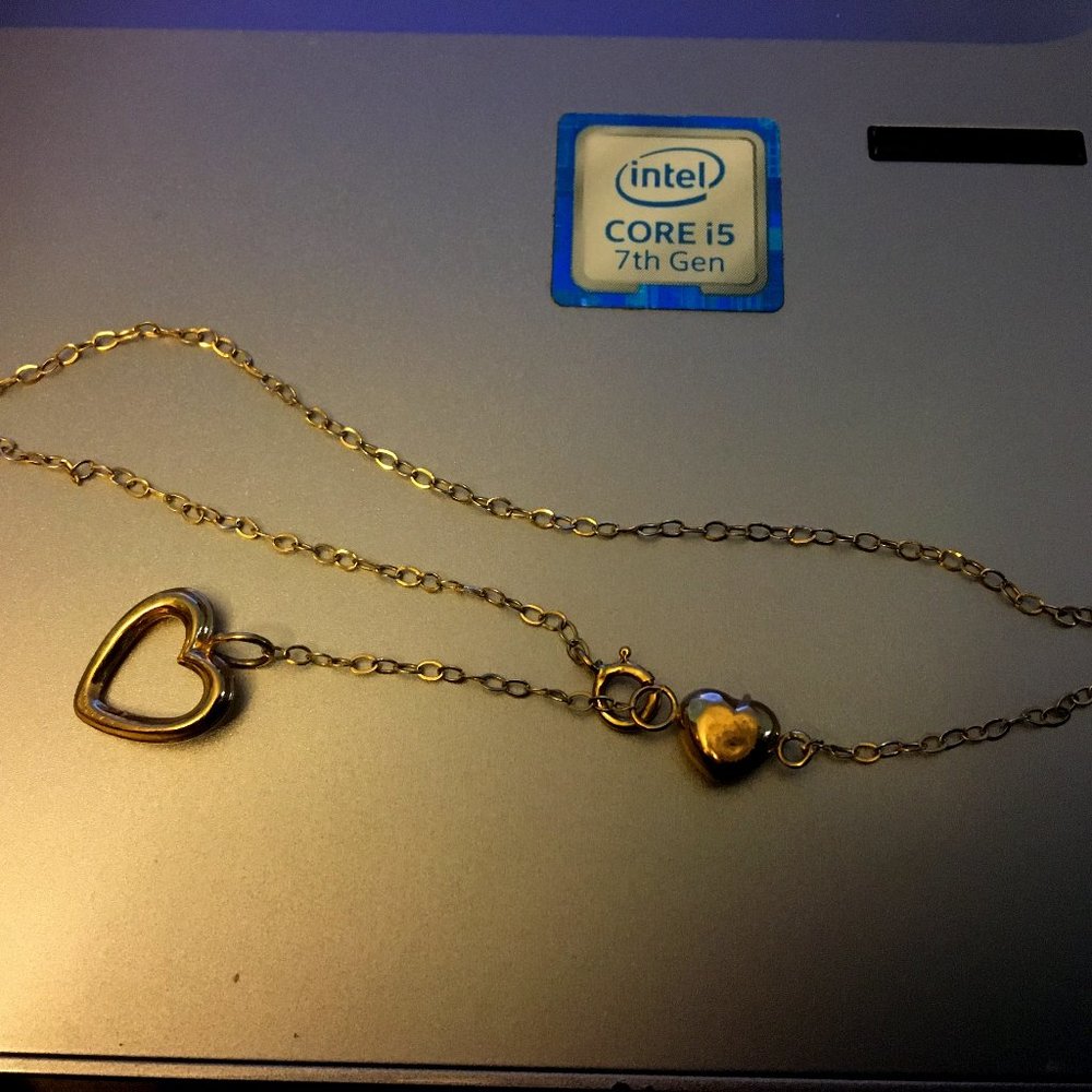 10KT GOLD ANKLET WITH TWO HEART CHARMS!